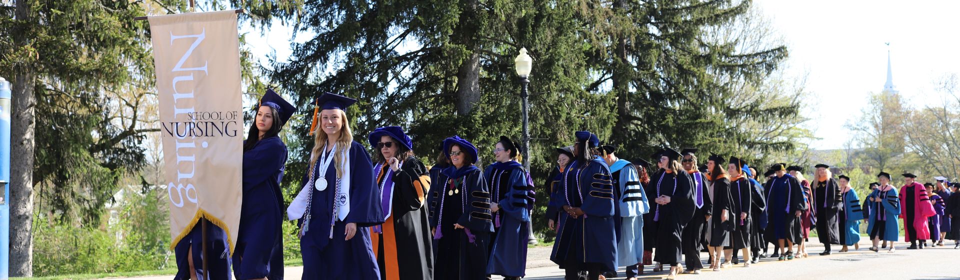 UConn Nursing Students walking during commencement